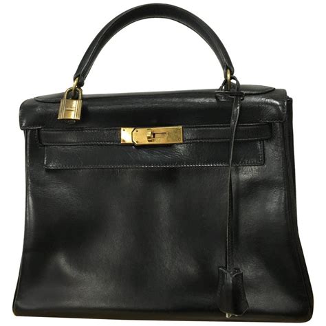 vintage black leather hermes bag with chain front|vintage Hermes handbags.